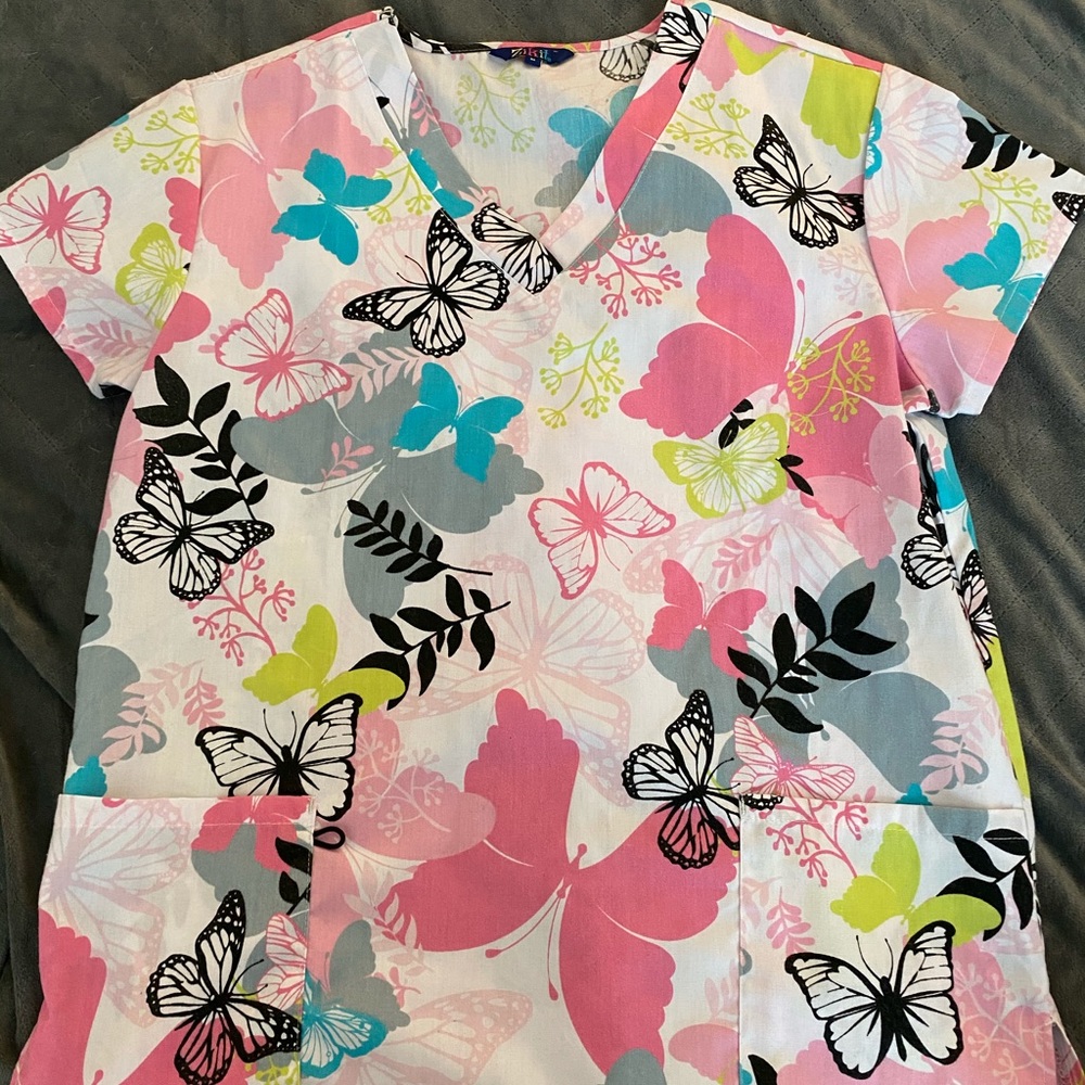 Women’s butterfly print scrub top